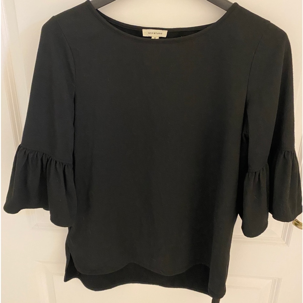Women’s size medium shirt.